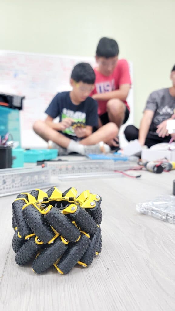 ICC Robotics Club students working on robots